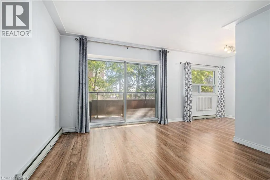 11 WOODMAN Drive Unit# 203, #203