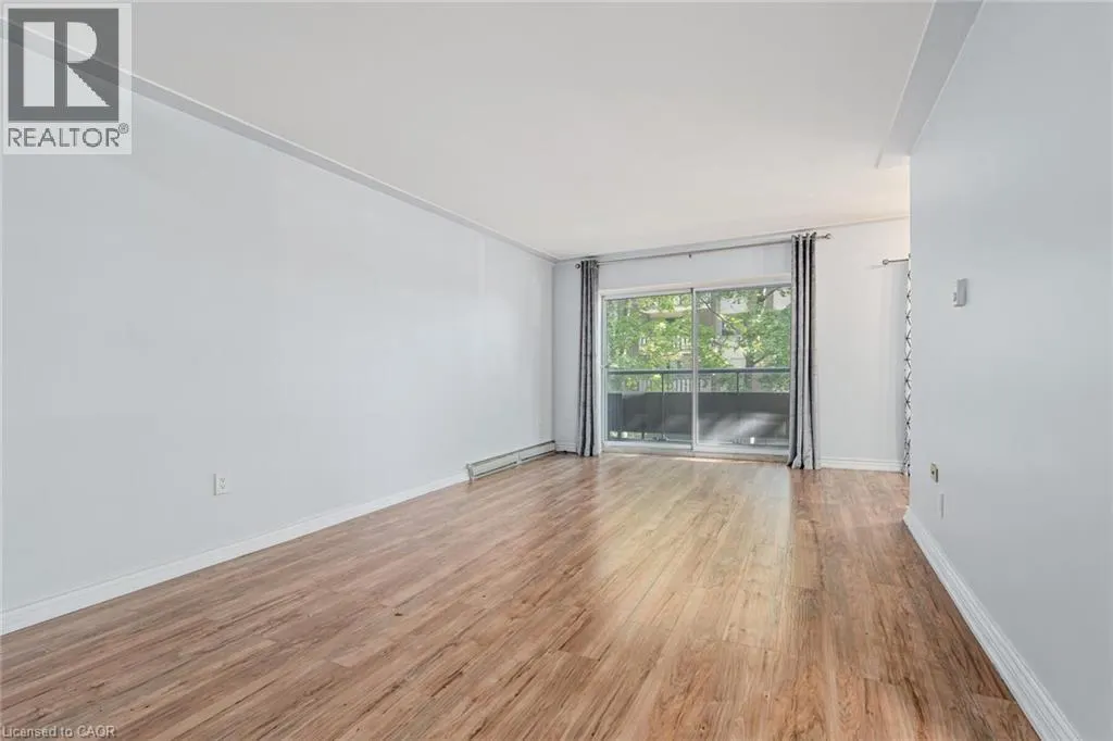 11 WOODMAN Drive Unit# 203, #203