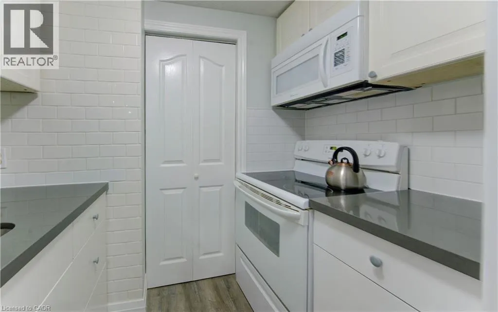 30 BRIDGE Street W Unit# 104, #104