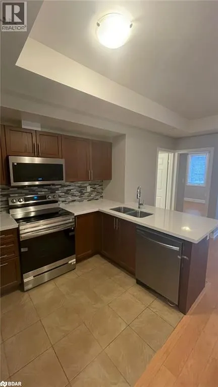 2420 BARONWOOD Drive Unit# 32-02, #32-02