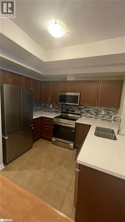 2420 BARONWOOD Drive Unit# 32-02, #32-02