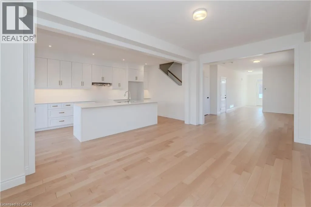406 ROBERT WOOLNER Street
