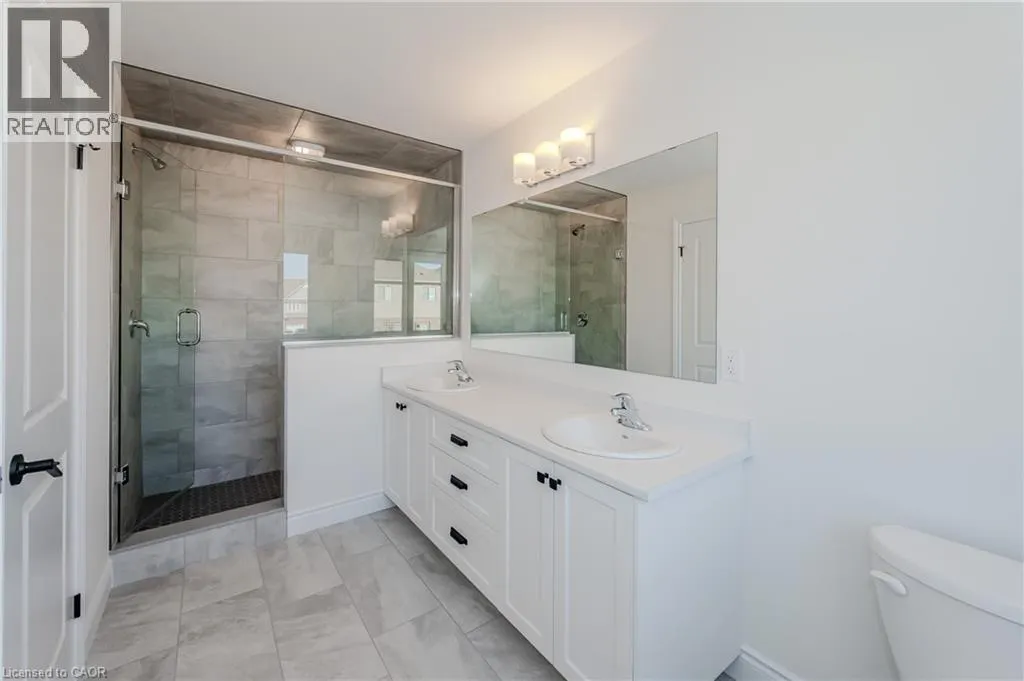 406 ROBERT WOOLNER Street