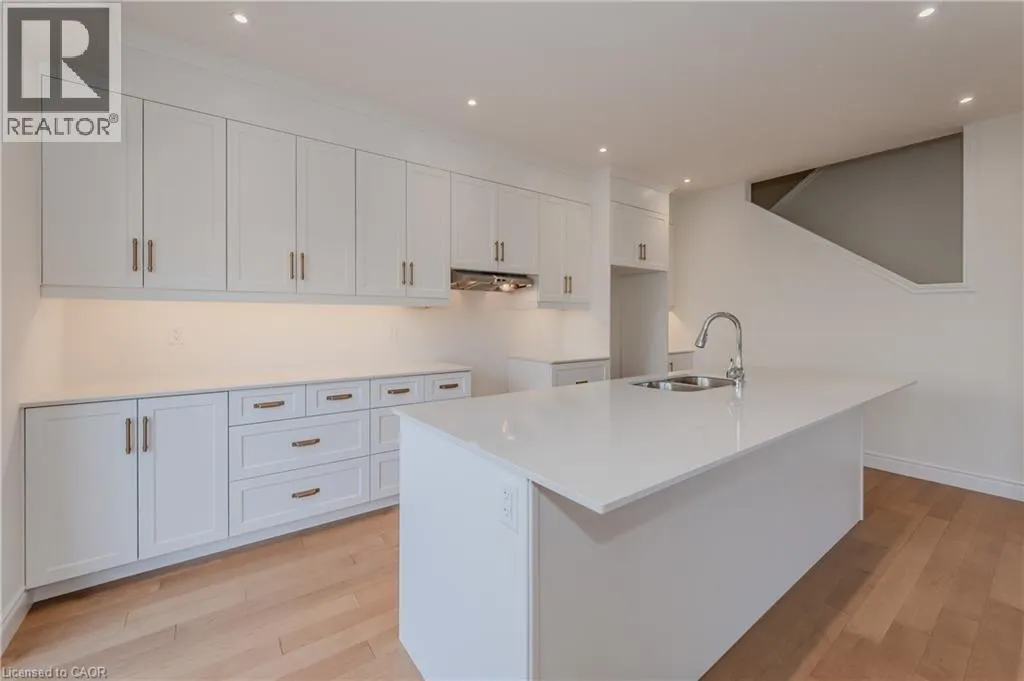 406 ROBERT WOOLNER Street