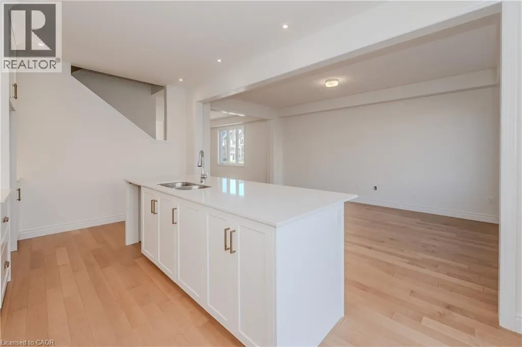 406 ROBERT WOOLNER Street