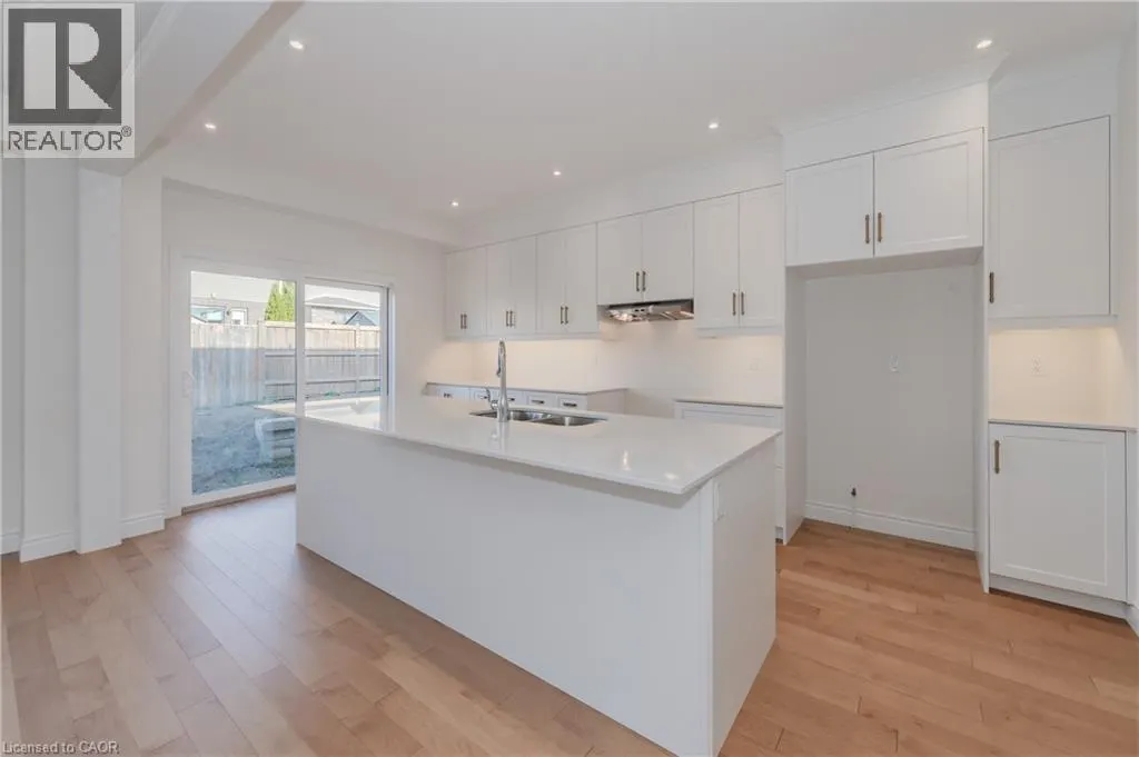 406 ROBERT WOOLNER Street