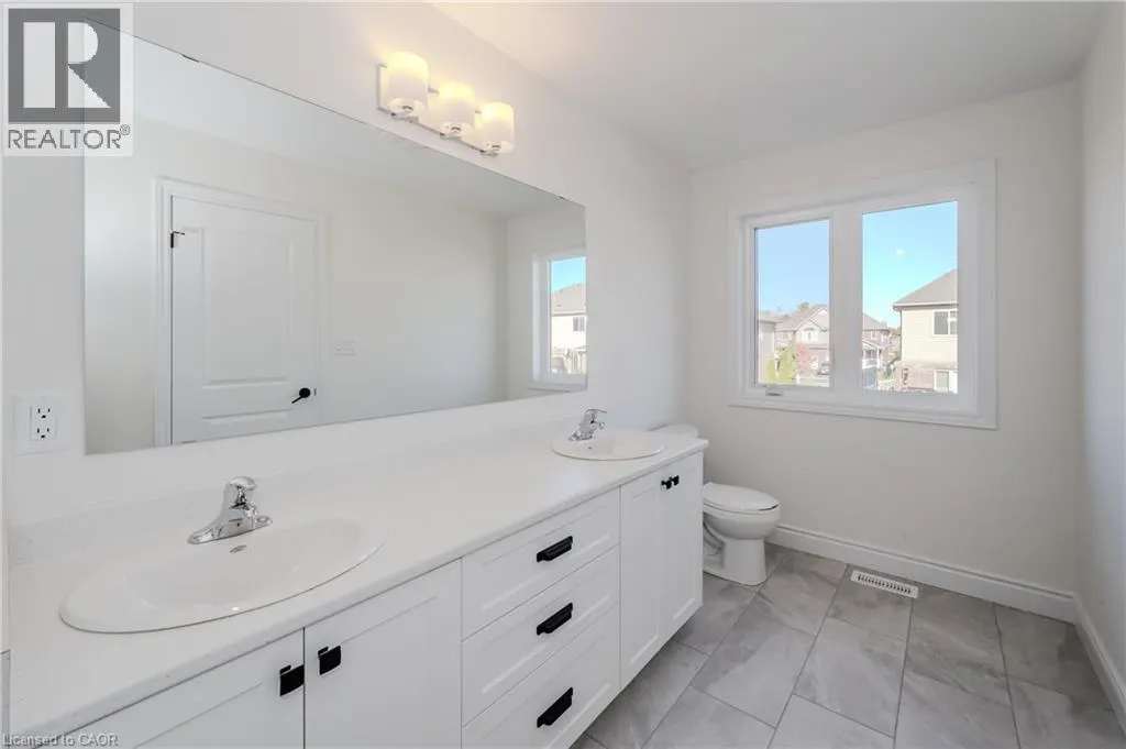 406 ROBERT WOOLNER Street