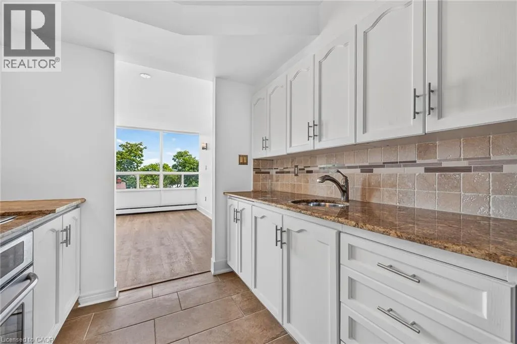 10 JOHN Street W Unit# 409 #409