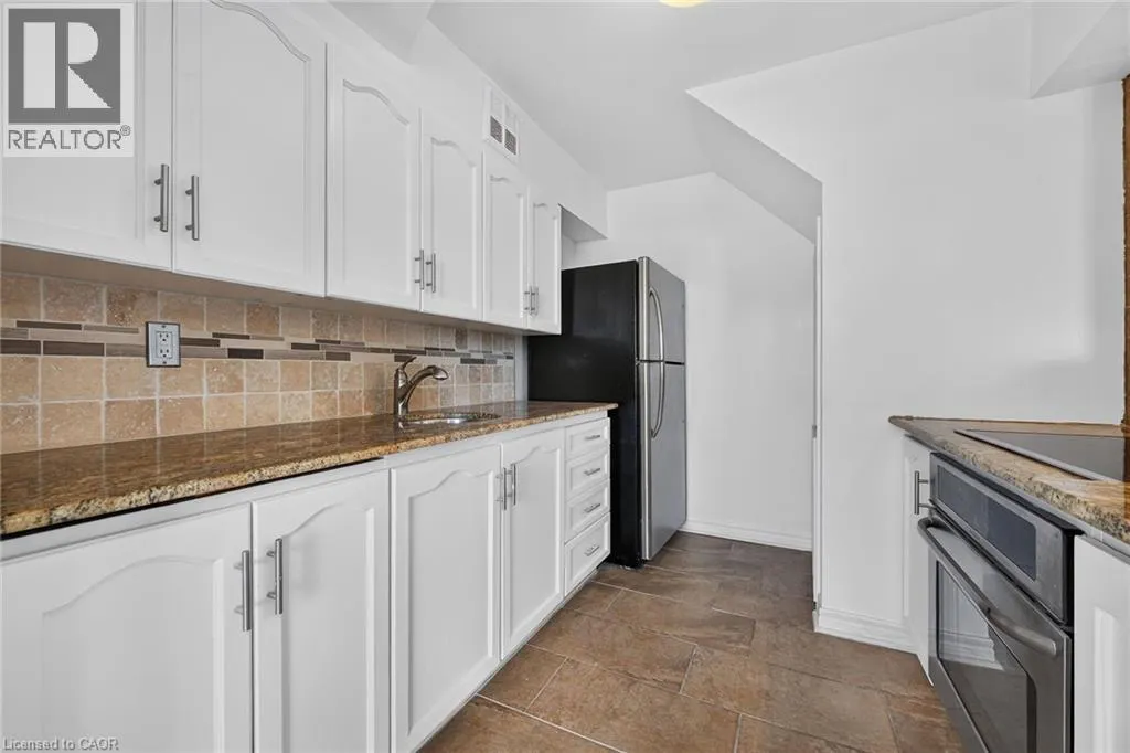 10 JOHN Street W Unit# 409 #409