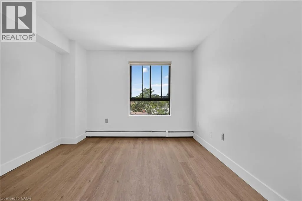 10 JOHN Street W Unit# 409 #409