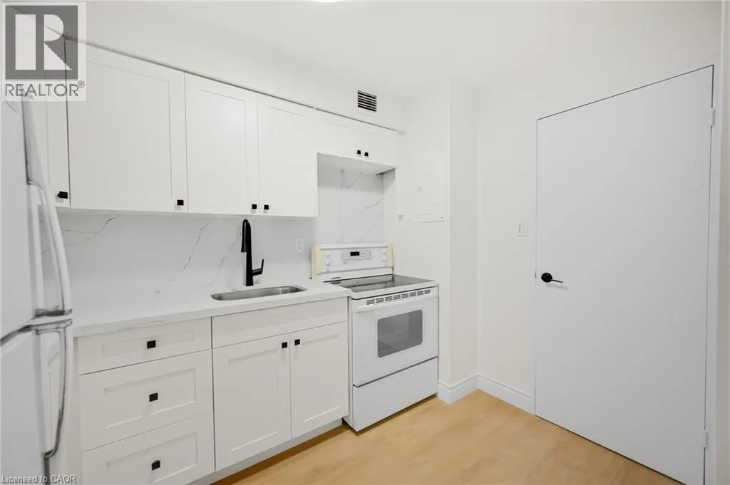 975 WARWICK Court Unit# 310 #310