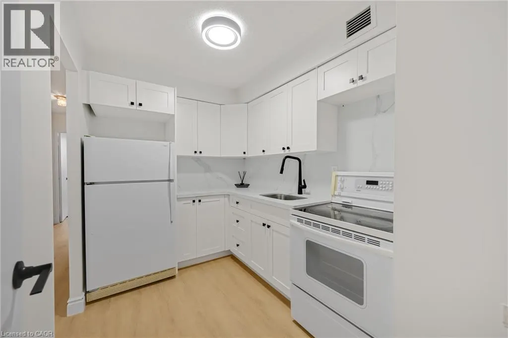 975 WARWICK Court Unit# 310 #310