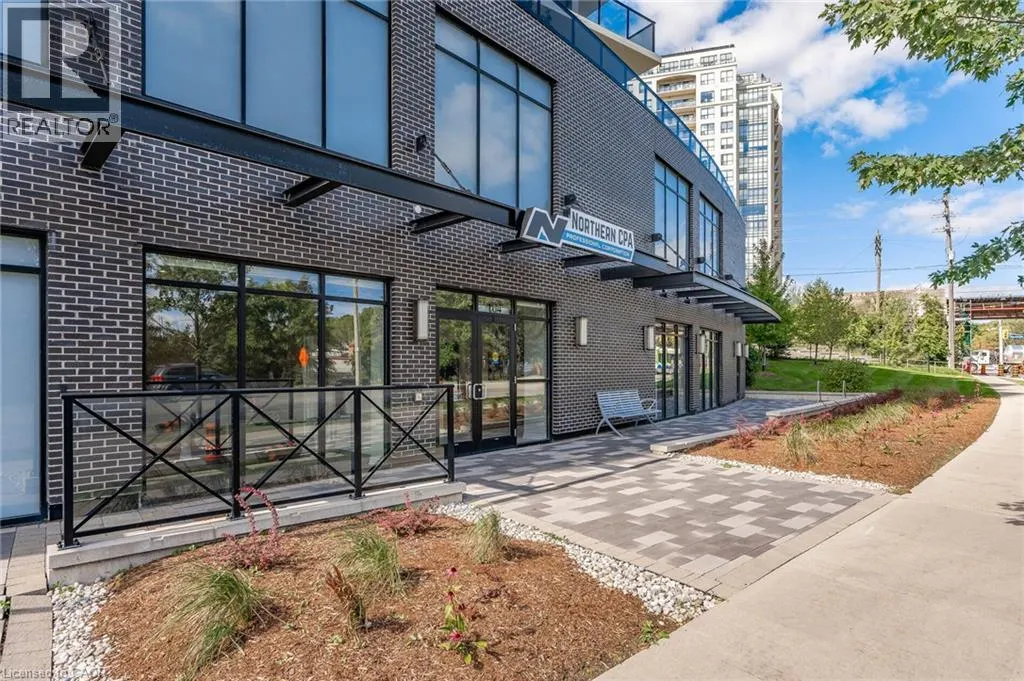150 E WELLINGTON Street E Unit# 104 #104