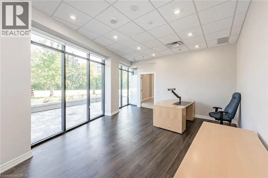 150 E WELLINGTON Street E Unit# 104 #104