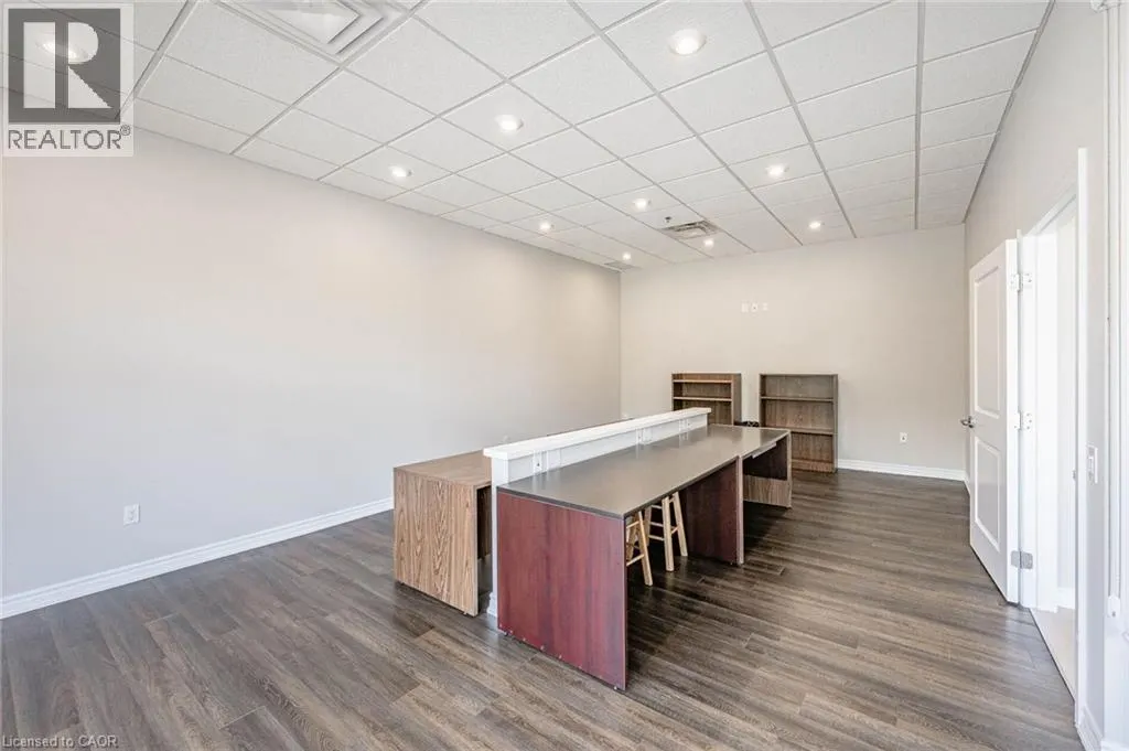 150 E WELLINGTON Street E Unit# 104 #104
