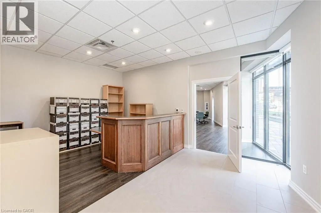 150 E WELLINGTON Street E Unit# 104 #104