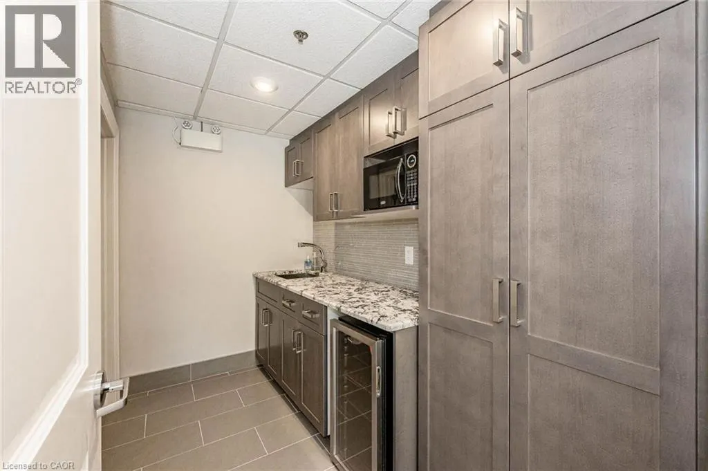 150 E WELLINGTON Street E Unit# 104 #104