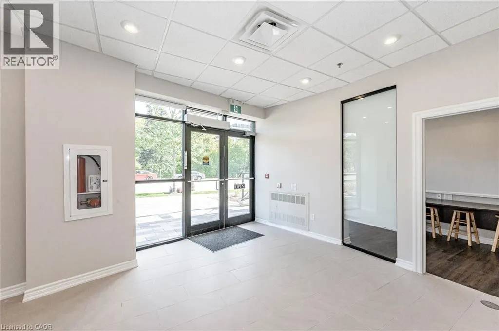 150 E WELLINGTON Street E Unit# 104 #104
