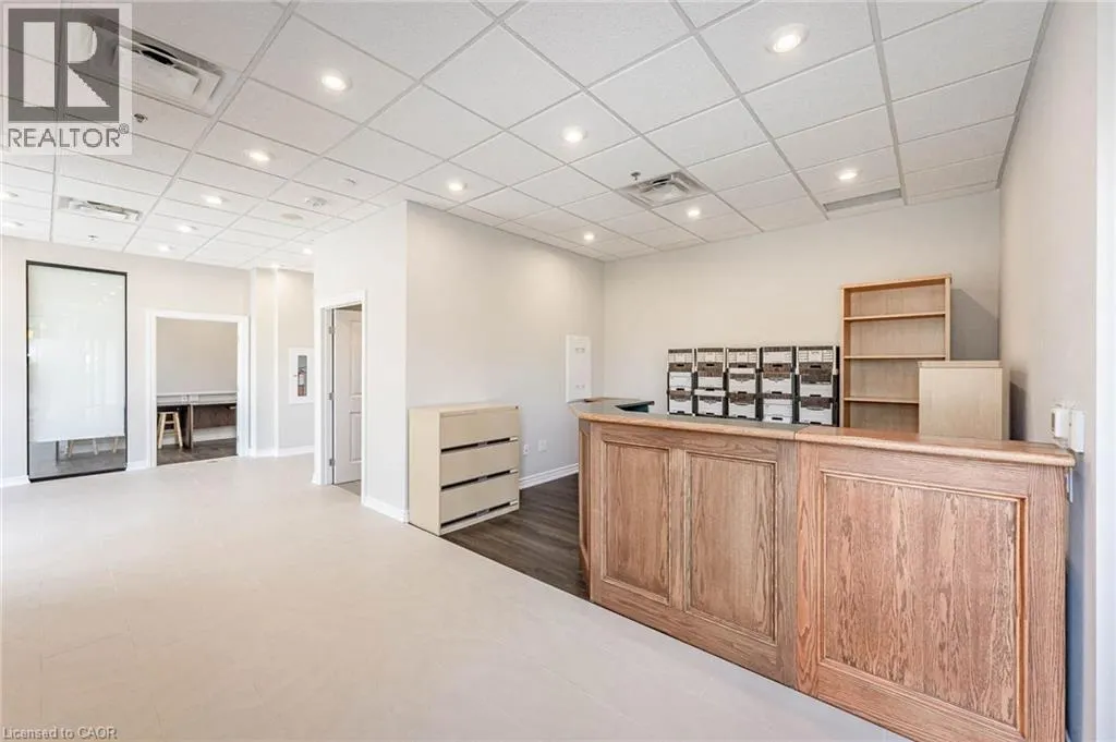 150 E WELLINGTON Street E Unit# 104 #104