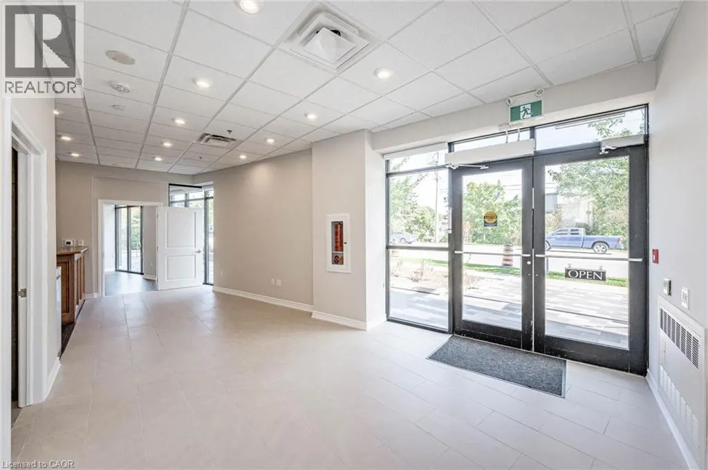 150 E WELLINGTON Street E Unit# 104 #104