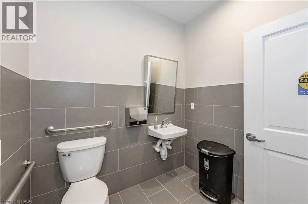 150 E WELLINGTON Street E Unit# 104 #104