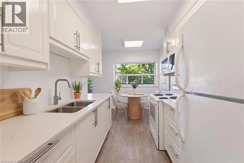 11 WOODMAN Drive S Unit# 210 #210