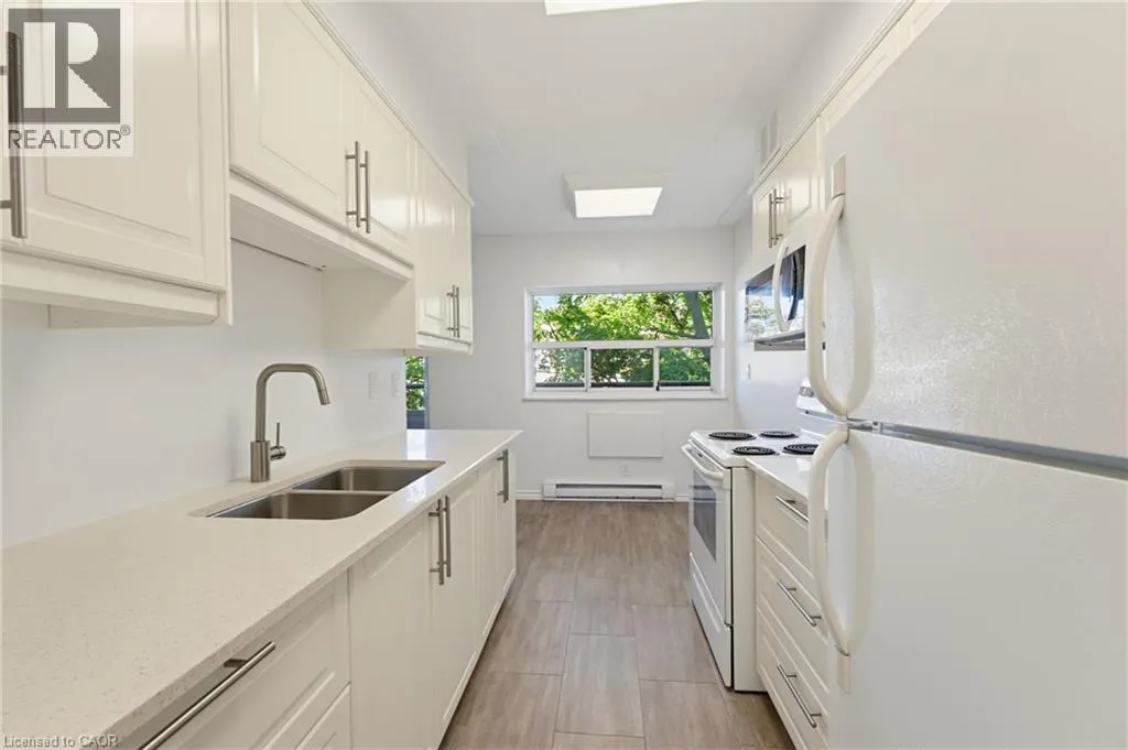 11 WOODMAN Drive S Unit# 210 #210