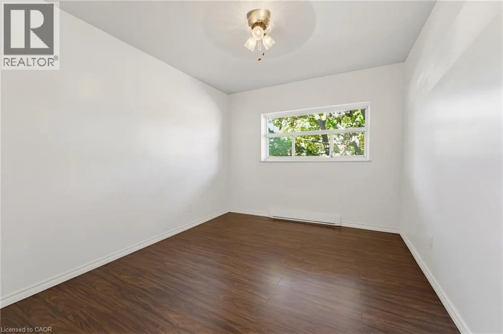 11 WOODMAN Drive S Unit# 210 #210