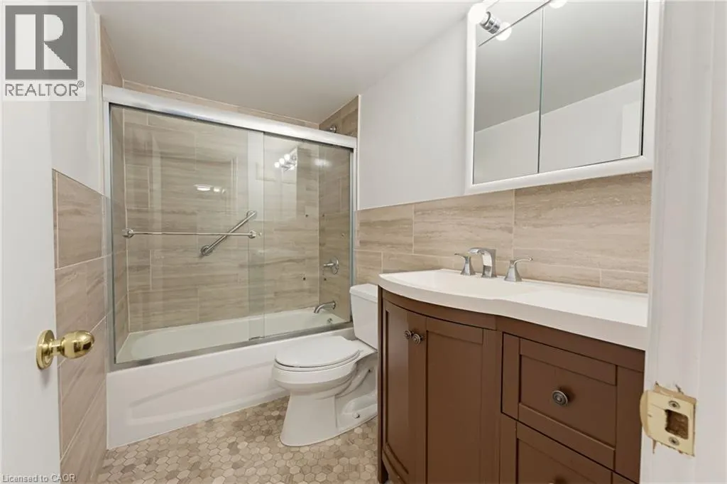11 WOODMAN Drive S Unit# 210 #210