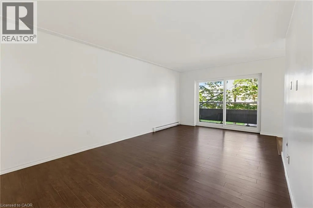 11 WOODMAN Drive S Unit# 210 #210