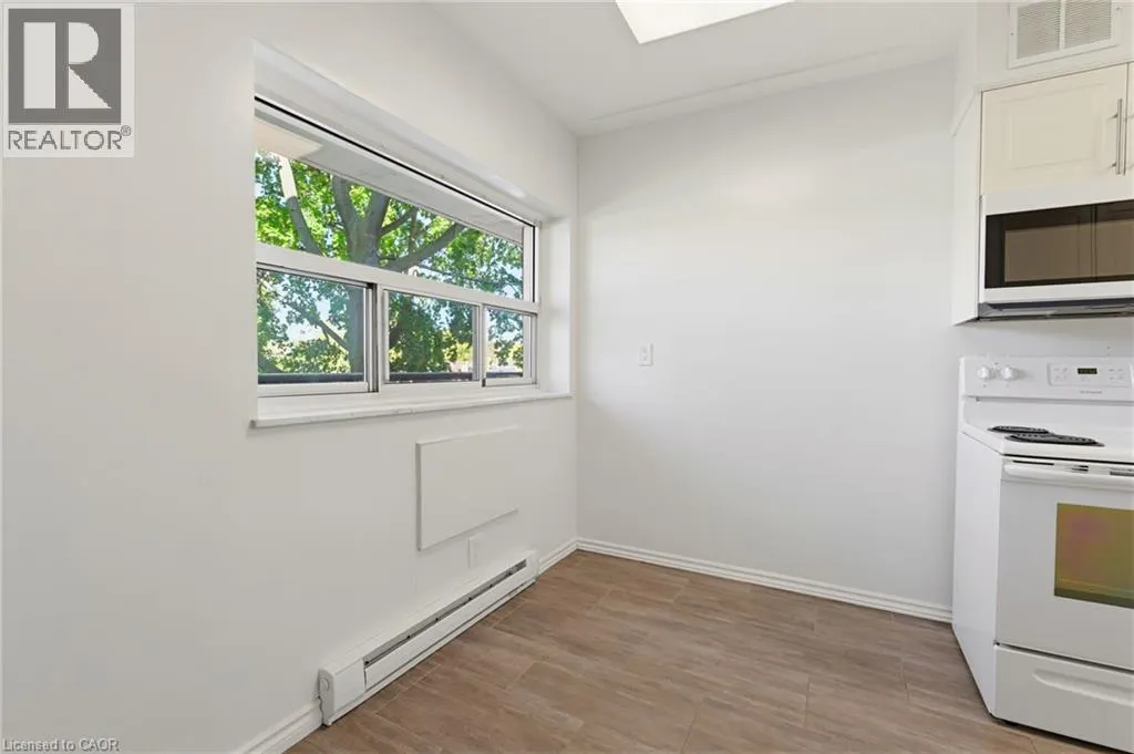 11 WOODMAN Drive S Unit# 210 #210