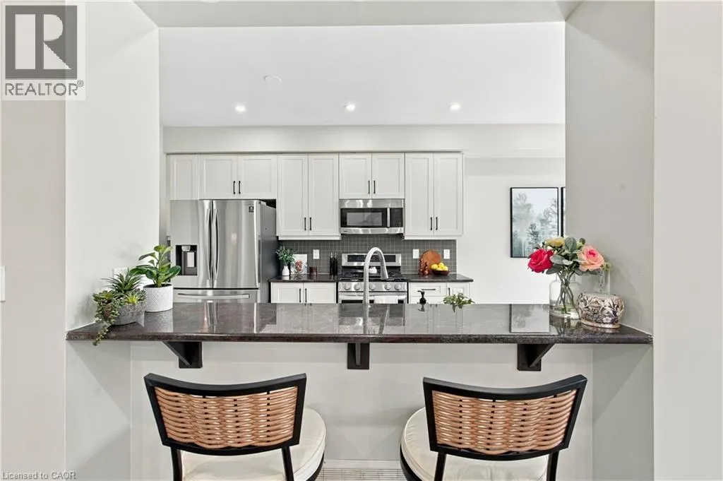 3275 STALYBRIDGE Drive Unit# 24 #24