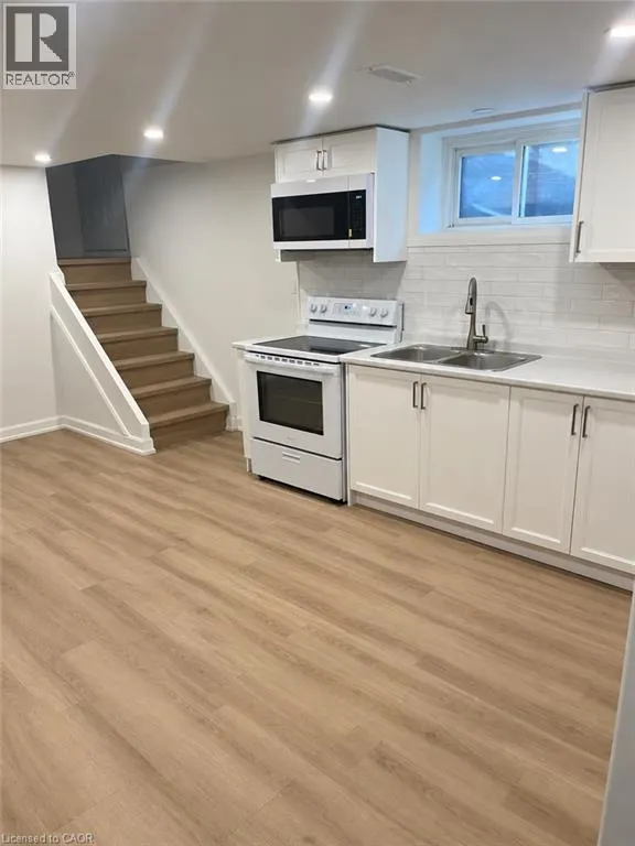 42 WOODMAN Drive S Unit# Lower #Lower
