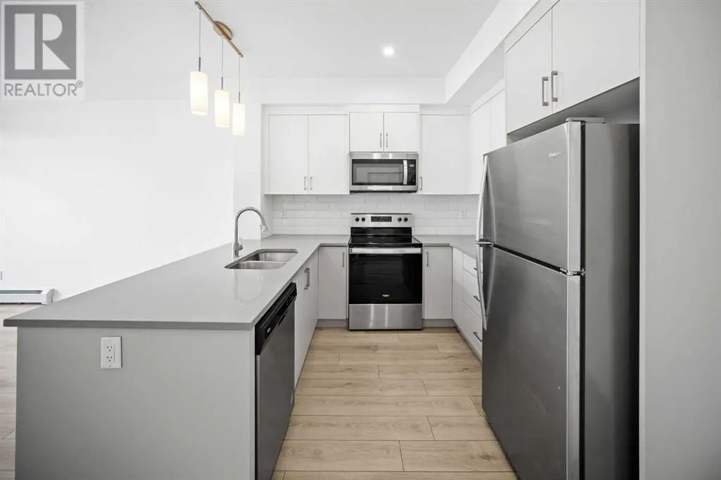 403, 205 Spring Creek Common SW