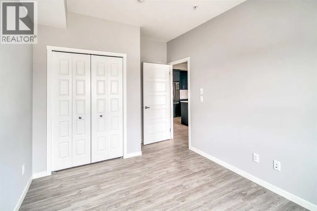 215, 300 Harvest Hills Place NE
