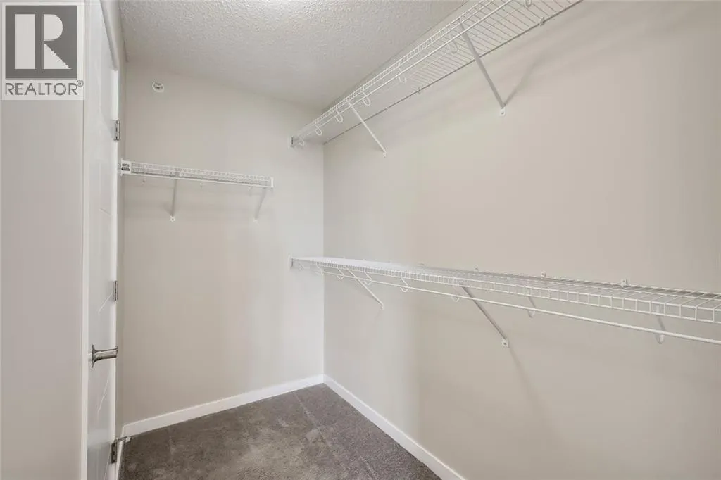 405, 402 MARQUIS Lane SE