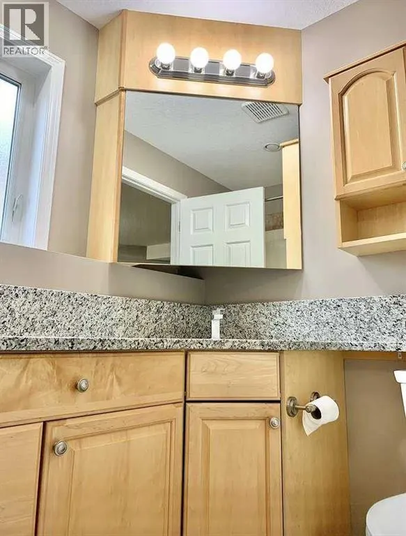 B, 410 Canyon Boulevard W