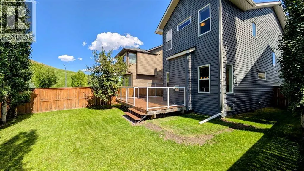 9 Cougar Ridge Rise SW