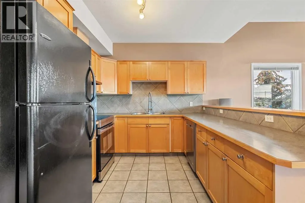 309, 15204 Bannister Road SE