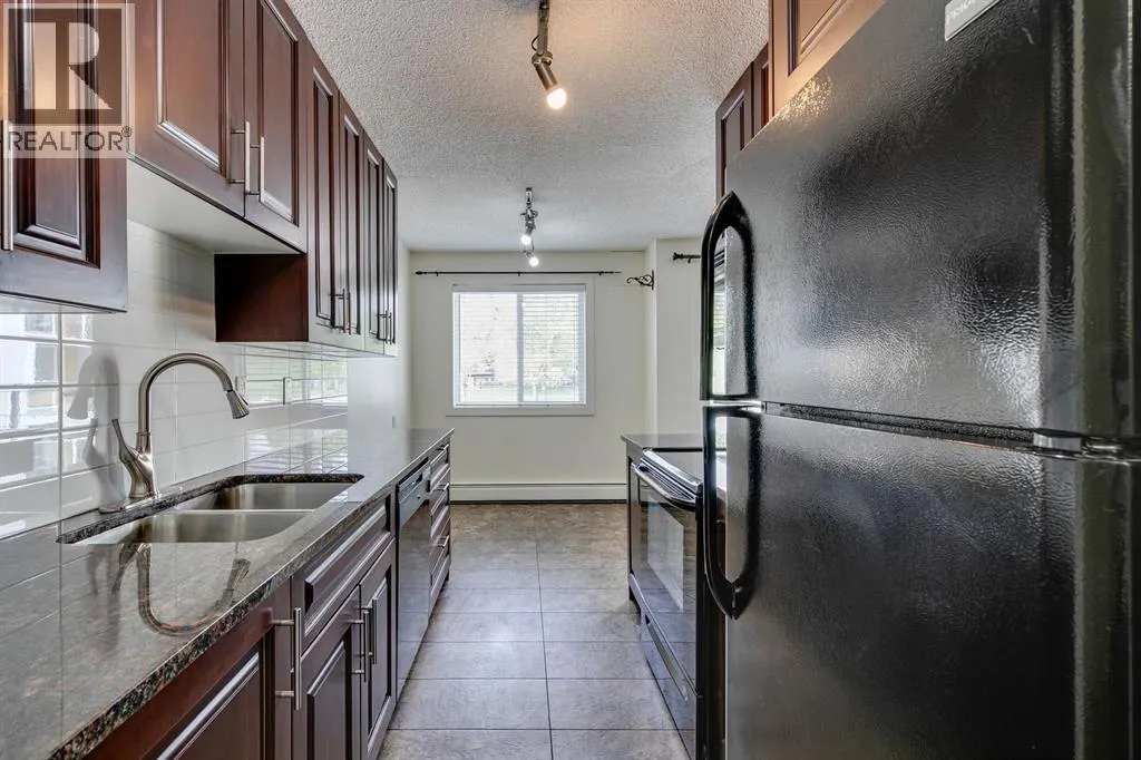 203, 4455A Greenview Drive NE