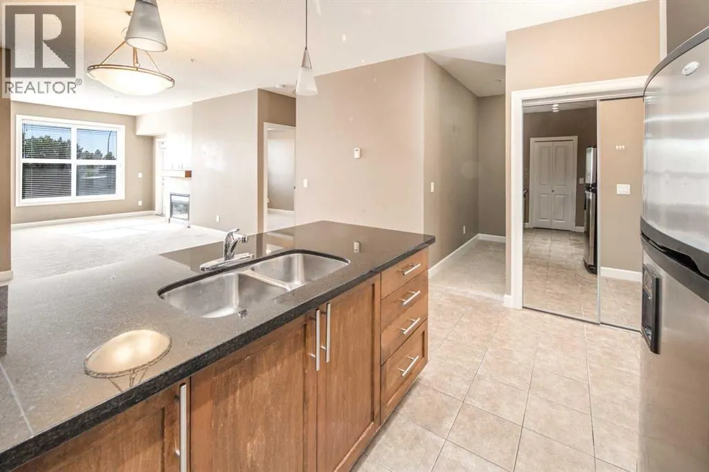 203, 88 Arbour Lake Road NW