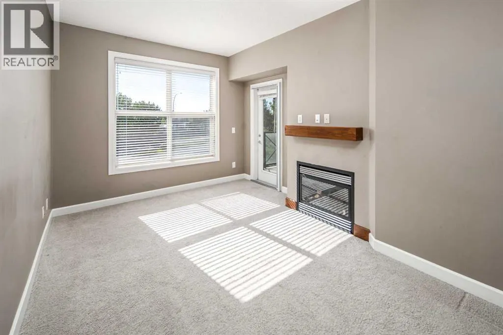 203, 88 Arbour Lake Road NW