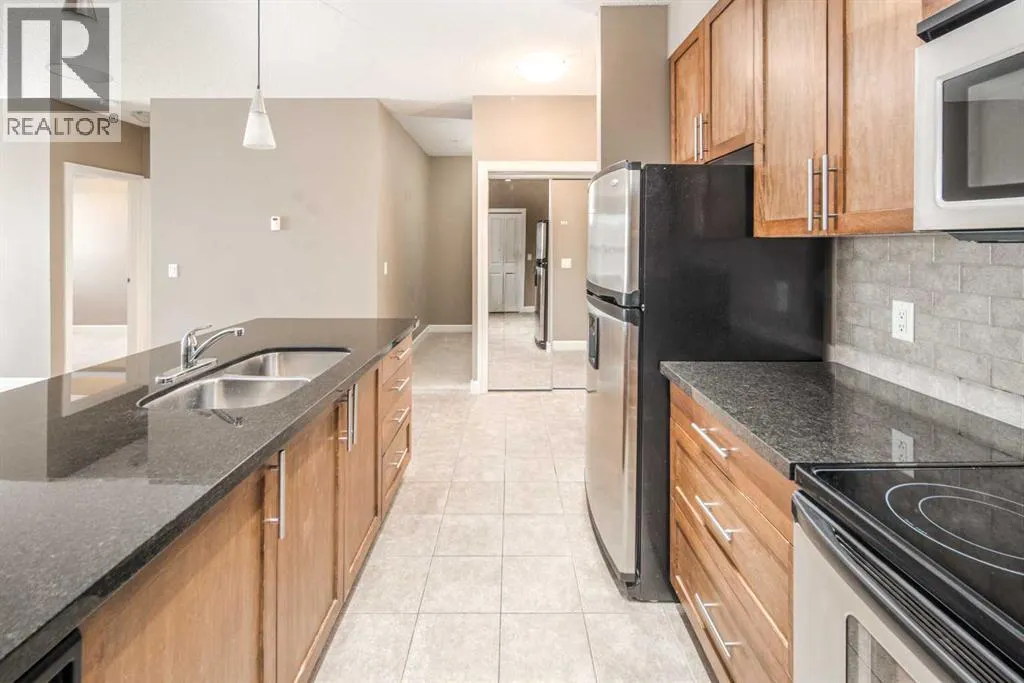 203, 88 Arbour Lake Road NW