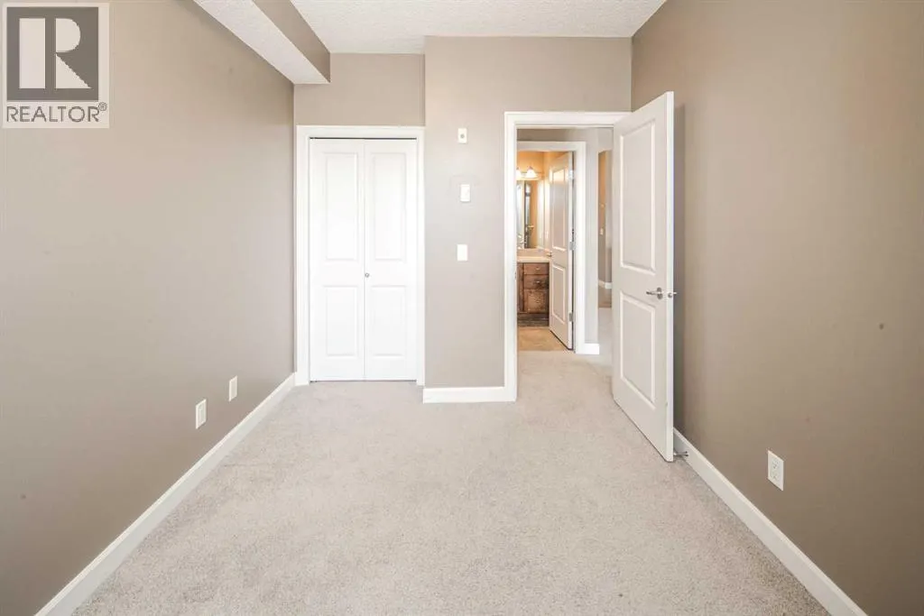 203, 88 Arbour Lake Road NW