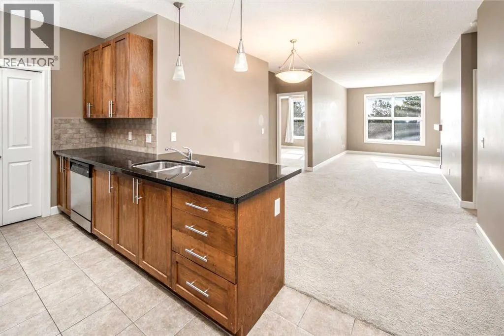 203, 88 Arbour Lake Road NW