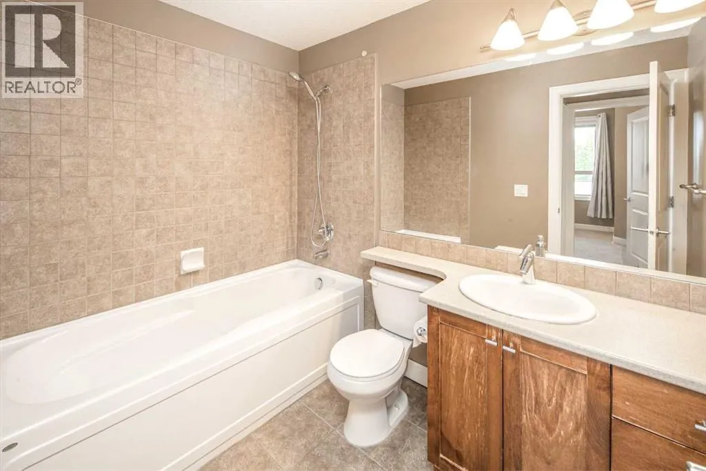 203, 88 Arbour Lake Road NW