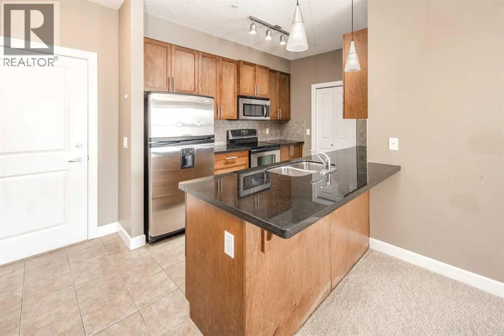 203, 88 Arbour Lake Road NW