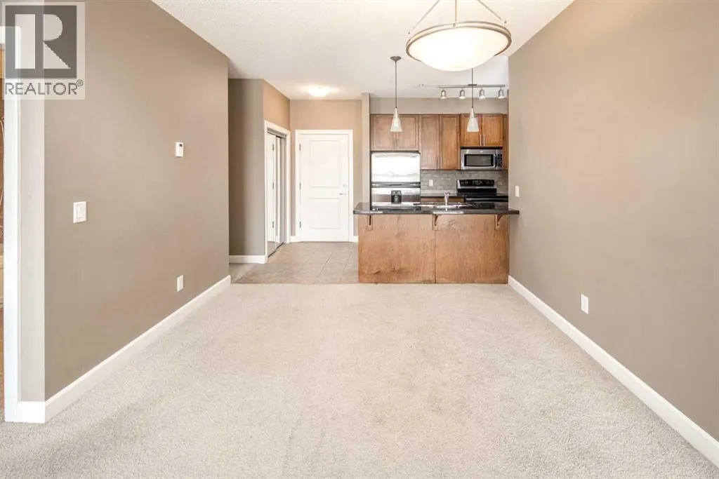 203, 88 Arbour Lake Road NW