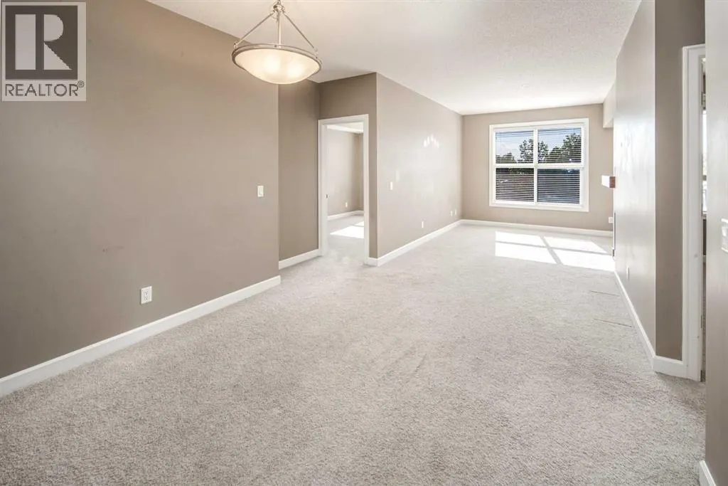 203, 88 Arbour Lake Road NW