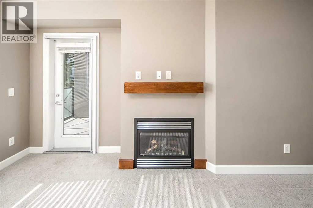 203, 88 Arbour Lake Road NW